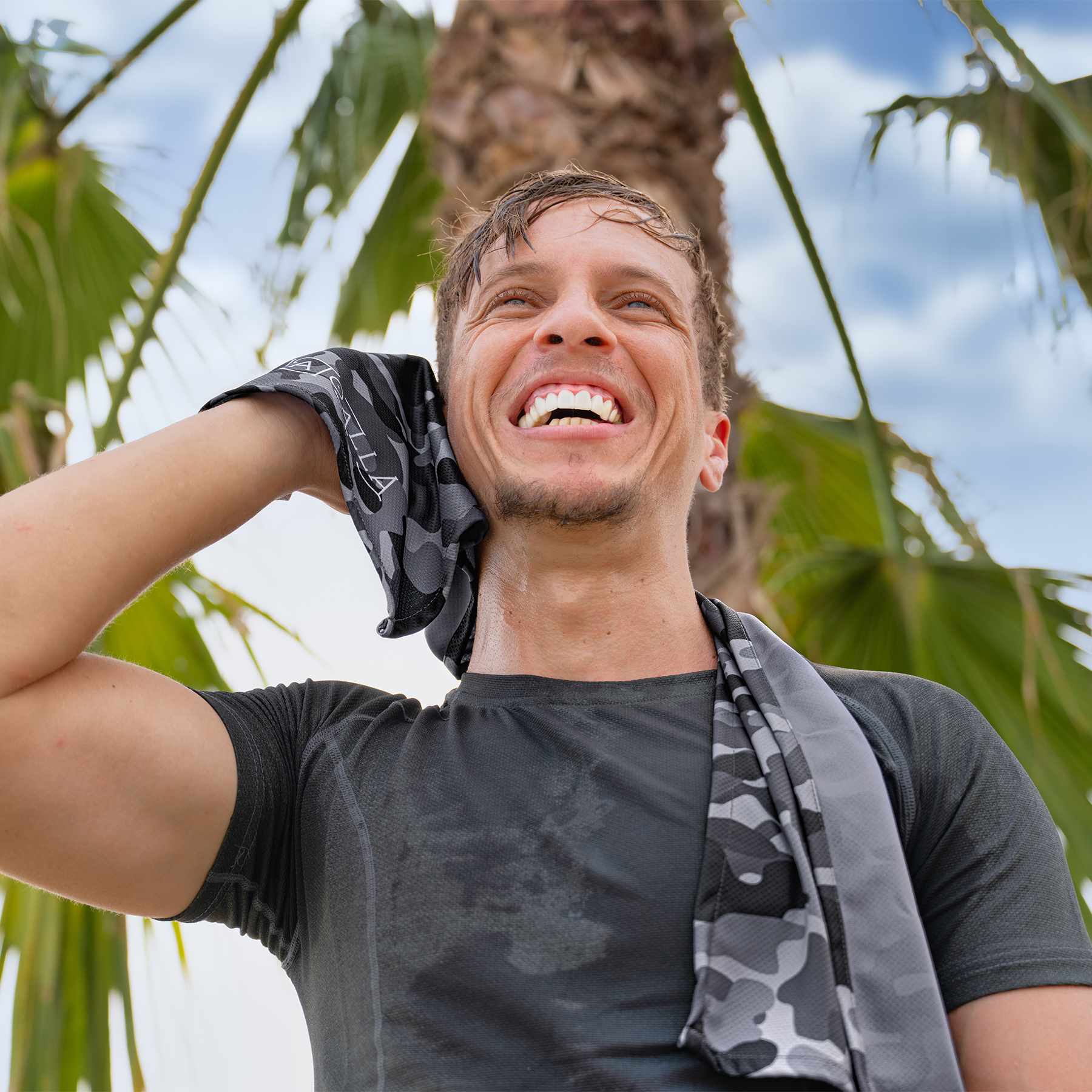 Athlete using sports cooling towel