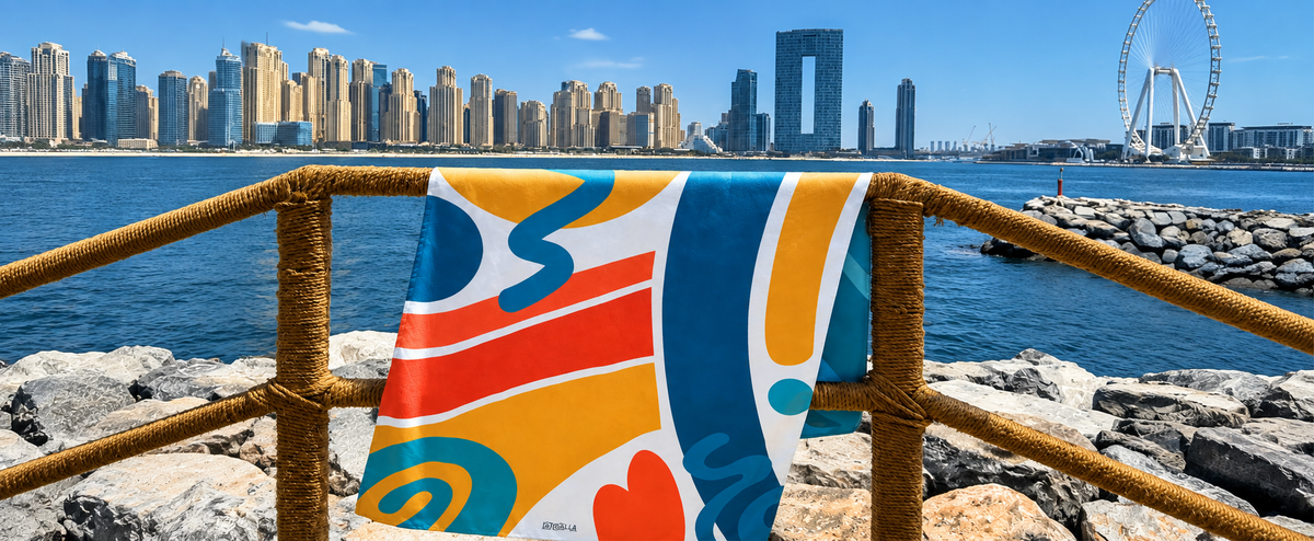 Quick-dry microfiber beach towel drying in the sun